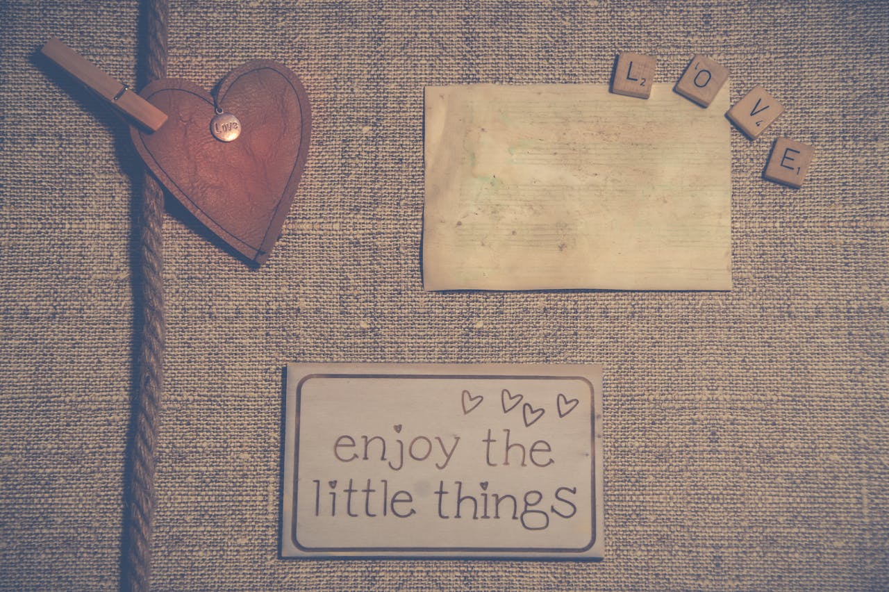 A rustic composition featuring love themed messages and textures for heartfelt sentiments.